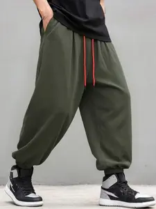 Men's stylish loose Plain linen long pants, summer lightweight wide-leg harem pants, breathable and quick-drying sports pants, suitable for wearing in spring, summer and autumn, hip-hop style flared pants