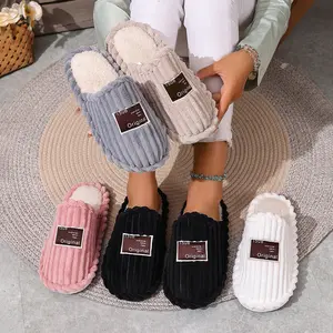 Lady's thick-soled warm and soft indoor-outdoor floor slippers made of plush fabric, suitable for postpartum recovery.