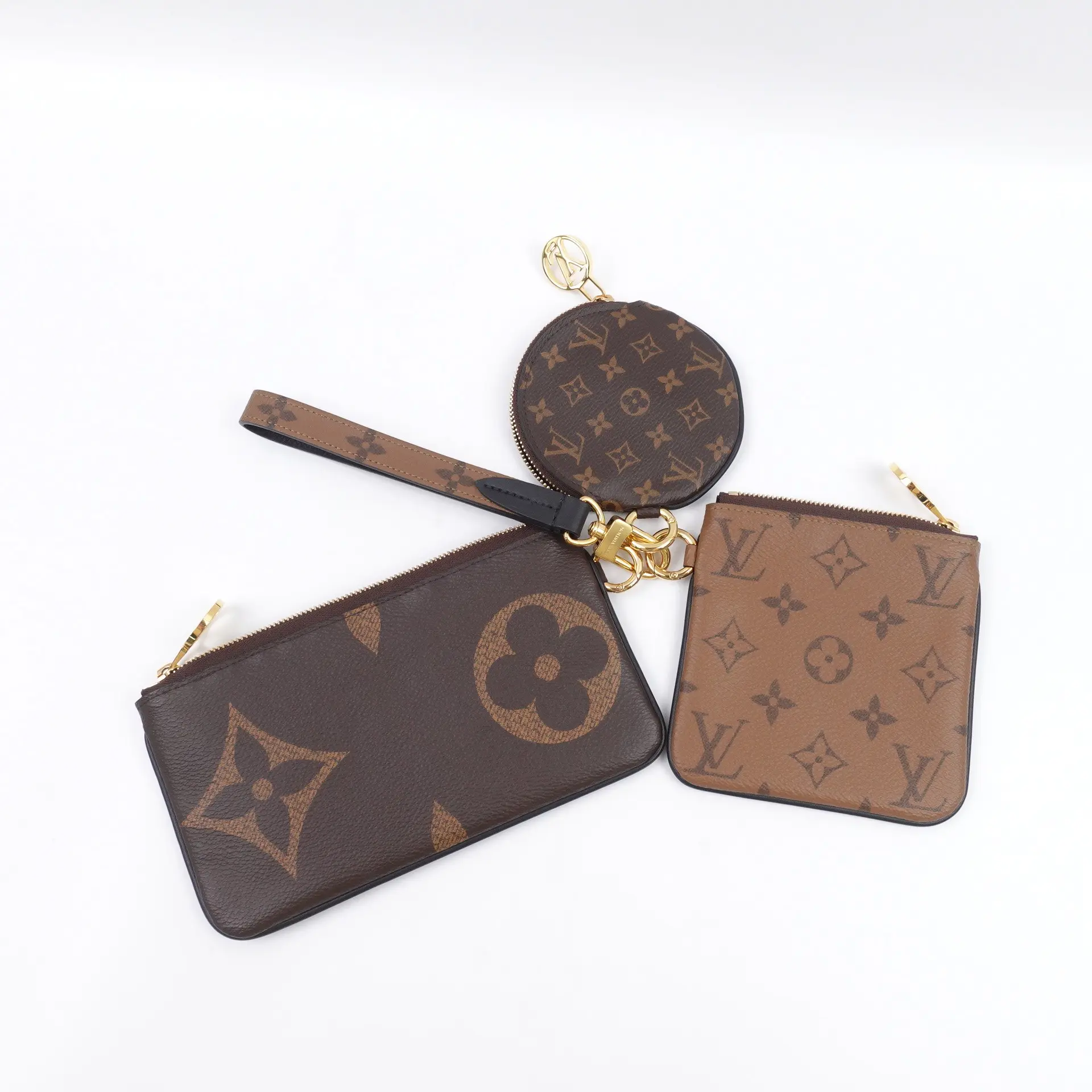 Pre-owned Louis Vuitton Coated Canvas Small Leather Goods Trio Reverse Monogram Wristlet T10423739
