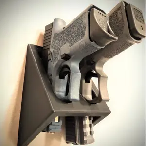 1 wall-mounted pistol rack (with two slots), used for storing pistols in gun cabinets or on walls. It can be installed behind a door or under a table, suitable for concealment.Gun display stand