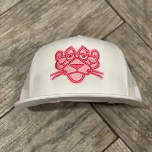 Pantera Pink on White Trucker hat.