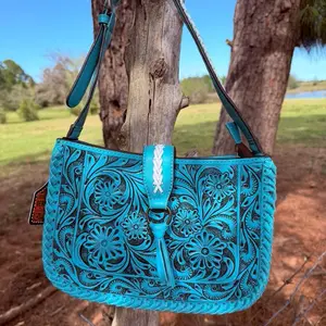 Turquoise Floral Embossed Leather Shoulder Bag with Adjustable Strap and Tassel Detail