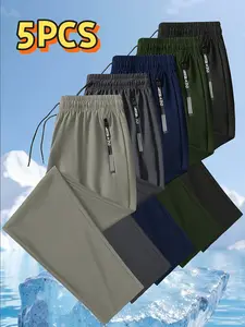 Set of 5 men’s ice silk jogging pants featuring breathable, mid-stretch fabric, an elastic waistband design, zippered pockets, nylon fabric—ideal for fitness enthusiasts and suitable for outdoor sports in summer. fit gym lightweight Soft Jogger Trousers,s