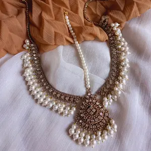 MathaPatti Adorned with Kundan Stones and Imitation Pearls, Decorative Headpiece, Gold and Silver Finish, Elegant Design for Any Occasion