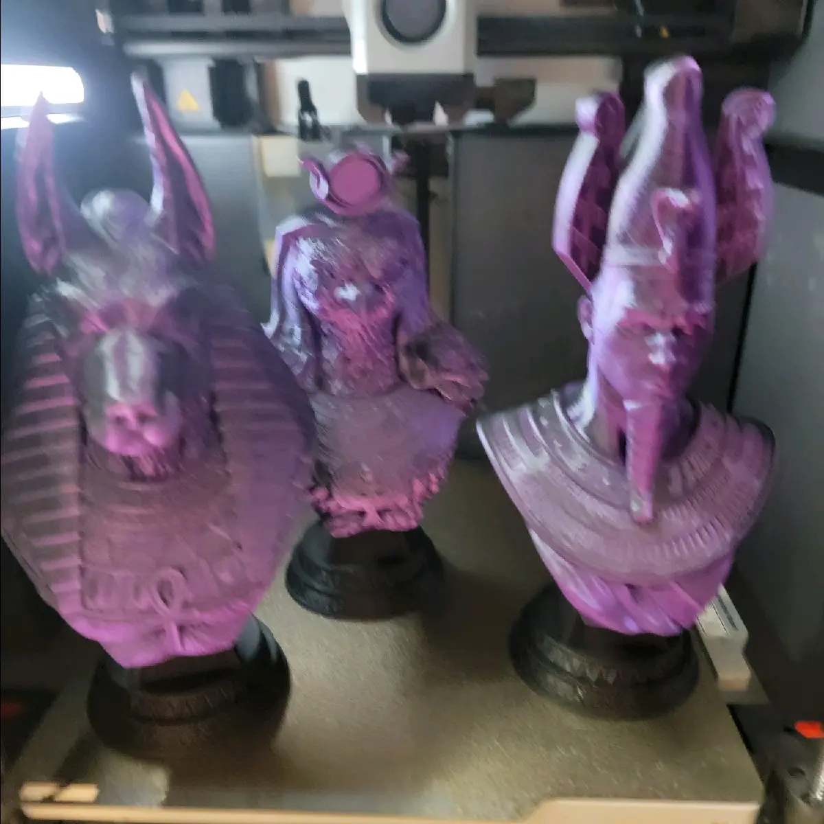 Busts of Egyptian gods (Anubis, Ra, Osiris)