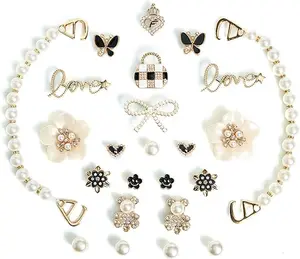 24 decorative shoe charms with shiny accents, floral and butterfly designs, plus pearl chains. Stylish DIY add-ons for events, gifts, or everyday wear.