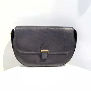 Pre-owned HERMÈS Hermes Vintage Black and Gold Ostrich Leather Saddle Bag Classic Design with Gold Accents
