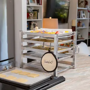 CounterCool® is the first countertop baking tray organizer that you can easily open and close whenever and wherever you need it.  Weighing under five pounds, CounterCool can support over 40 pounds on food across five standard half sheet trays.