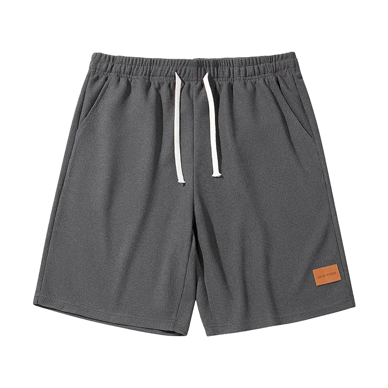 Men’s retro corduroy waffle-pattern casual shorts, loose fit with a slant pocket design, breathable street-style straight cut, suitable for relaxed city walks and outdoor activities — drawstring athletic shorts