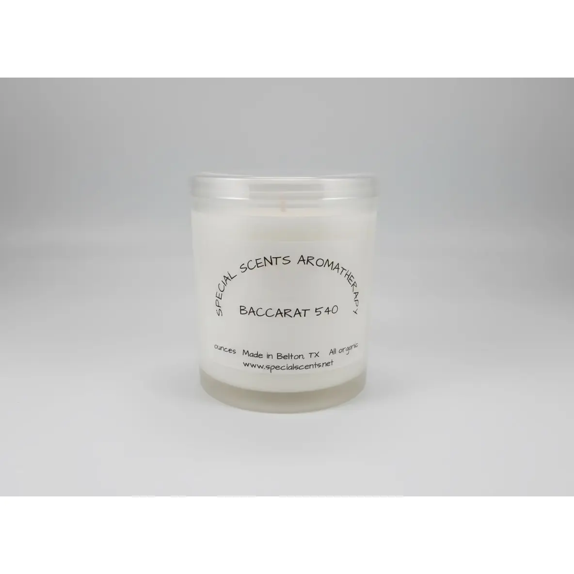 12 ounce candle in irridescent  glass wax petals