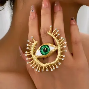 Vintage Adjustable Green Evil Eye Ring with Sparkling Details and Gold-Tone Design