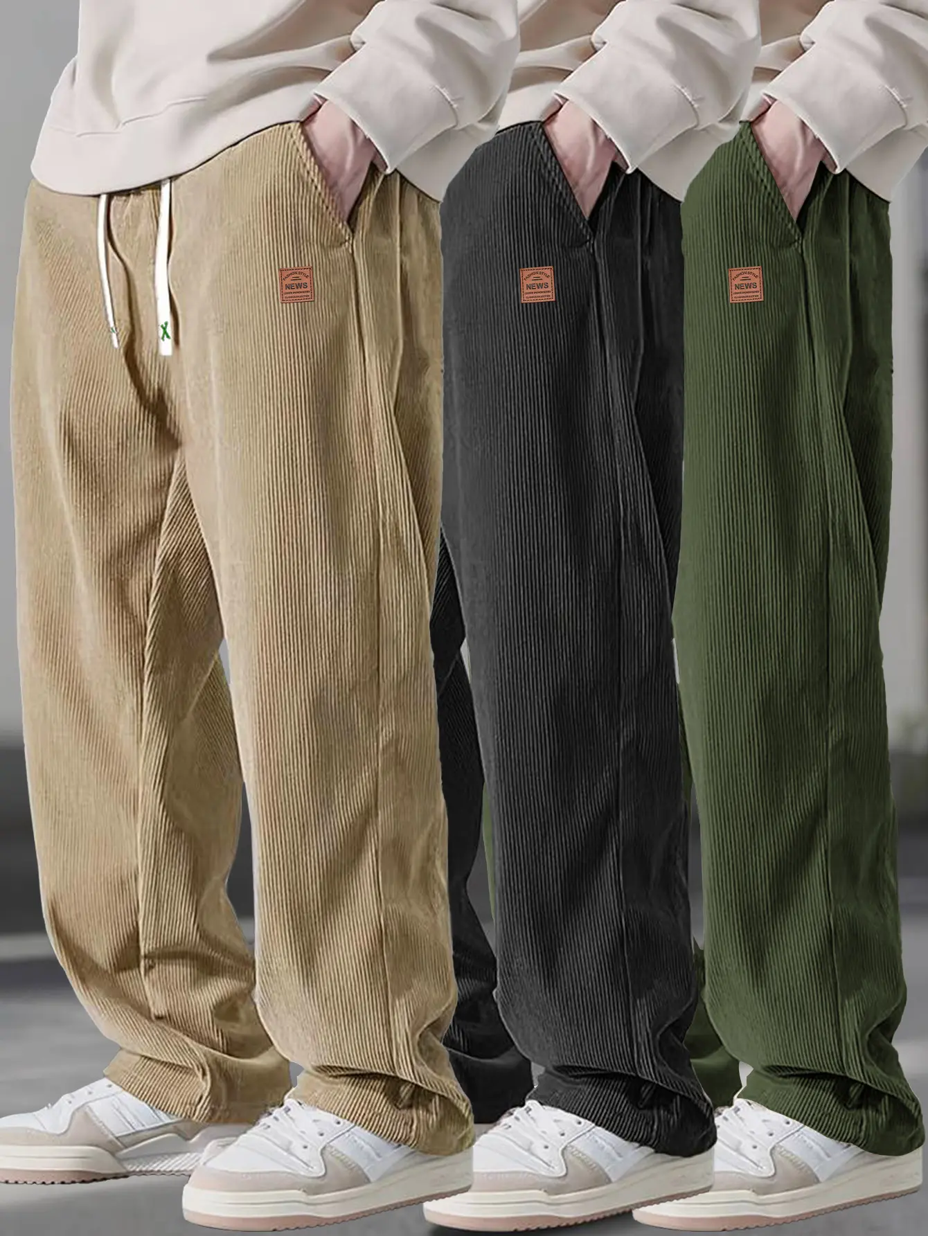 Men’s summer lightweight black corduroy casual pants, brown leather label, drawstring elastic waistband, loose straight fit with a drapey feel, versatile men’s trousers