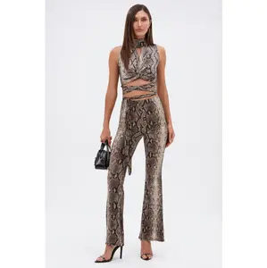 LOVE ME HARDER SNAKE FLARED LEGGING