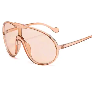Frames & Glasses - Champagne Tint Sunglasses with Unique Design Features