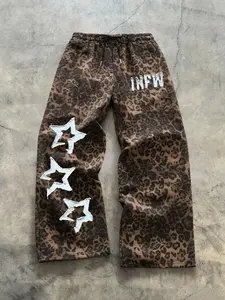 Unisex street style star leopard print pants with a relaxed fit, drawstring waistband, comfortable and casual design. Perfect for casual daily wear, stylish and sensual leopard prints suitable for hip-hop, campus, commuting, parties, and gatherings.