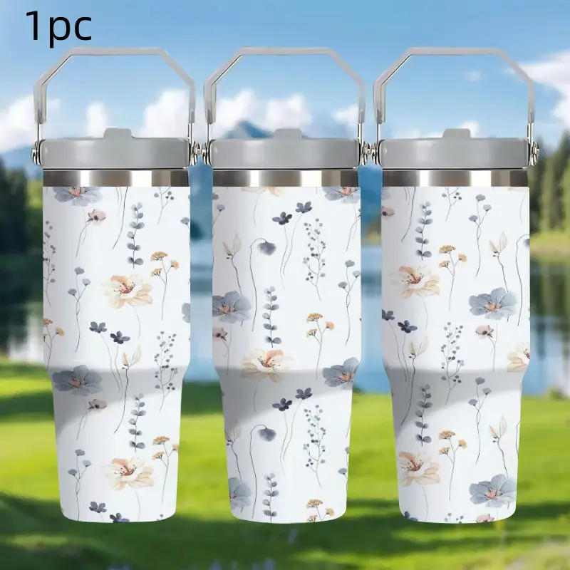 A 30oz  exquisite wildflower pattern insulated travel mug Tumbler with a handle, made of stainless steel with double-layer vacuum insulation. The design features a simple floral pattern. It is the perfect gift for women,  and nature lovers for Christmas