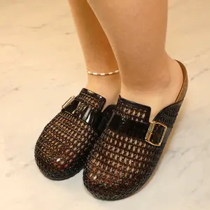 Lady fashion clogs with a closed toe, slip on, buckle embellished, round toe, with a flat heel