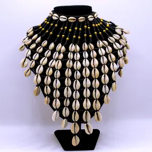 African inspired cowrie shells fringe neckpiece.