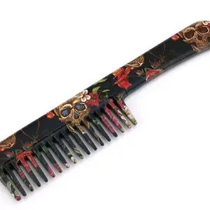 Decorative Toothed Comb with Skull and Floral Design for Stylish Hair protection & Grooming.