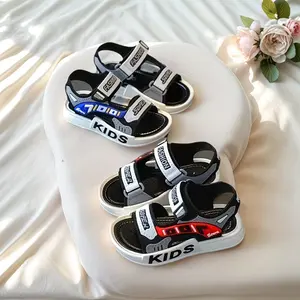 Stylish children’s sandals with a soft, non-slip sole, hook-and-loop closure, and fashionable letter design suitable for kids and students.