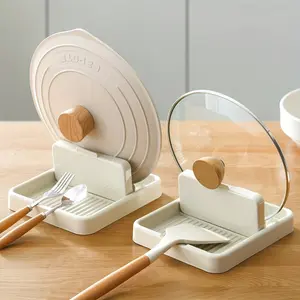 A foldable pot lid rack - A convenient pot lid rack for cooking and serving - Keeps spoons and cutlery neat and tidy - Suitable for kitchen countertops and stoves - Kitchenware