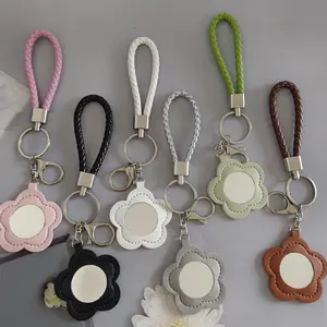 SleekHush 4pcs Flower-Shape PU Leather Keychain with Compact Makeup Mirror - Cute Portable Sports & Outdoor Protective Gear Bag Charm