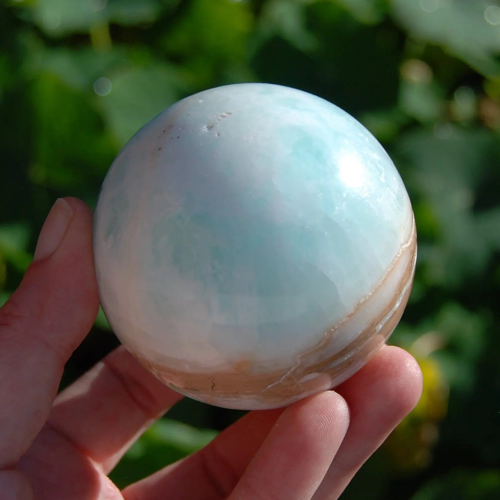 2.75in 460g Caribbean Blue Calcite Crystal Sphere, Pakistan