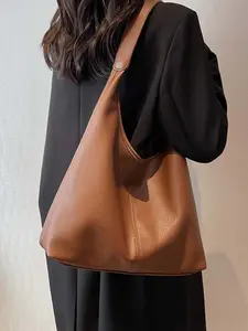 Simple versatile one-shoulder tote bag, retro caramel brown lychee pattern design,  crescent line one-shoulder bag, niche design, Fashionable shoulder bag, versatile and available in multiple colors, suitable for daily commuting, shopping, etc.