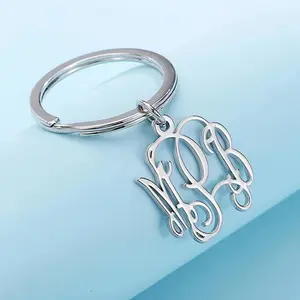 A Custom Letter Keychain Without a Chain - Elegantly Intertwined Letter Design, Unisex Heavy-Duty Key Ring - Perfect for Weddings, Anniversaries, And Birthday Gifts - Goldene Name Tag Pendant, Made of Stainless Steel, a Wedding Keepsake