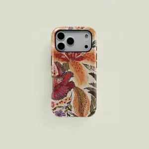 This orange-red bohemian-style protective case features fresh floral and leaf embroidery. It's a durable 2-in-1 case suitable for iPhone 17/16/15/14/13/12/11 Pro Max/Plus/Pro and Samsung Galaxy S26/S25/S24/S23 Ultra series. A simple and stylish phone case