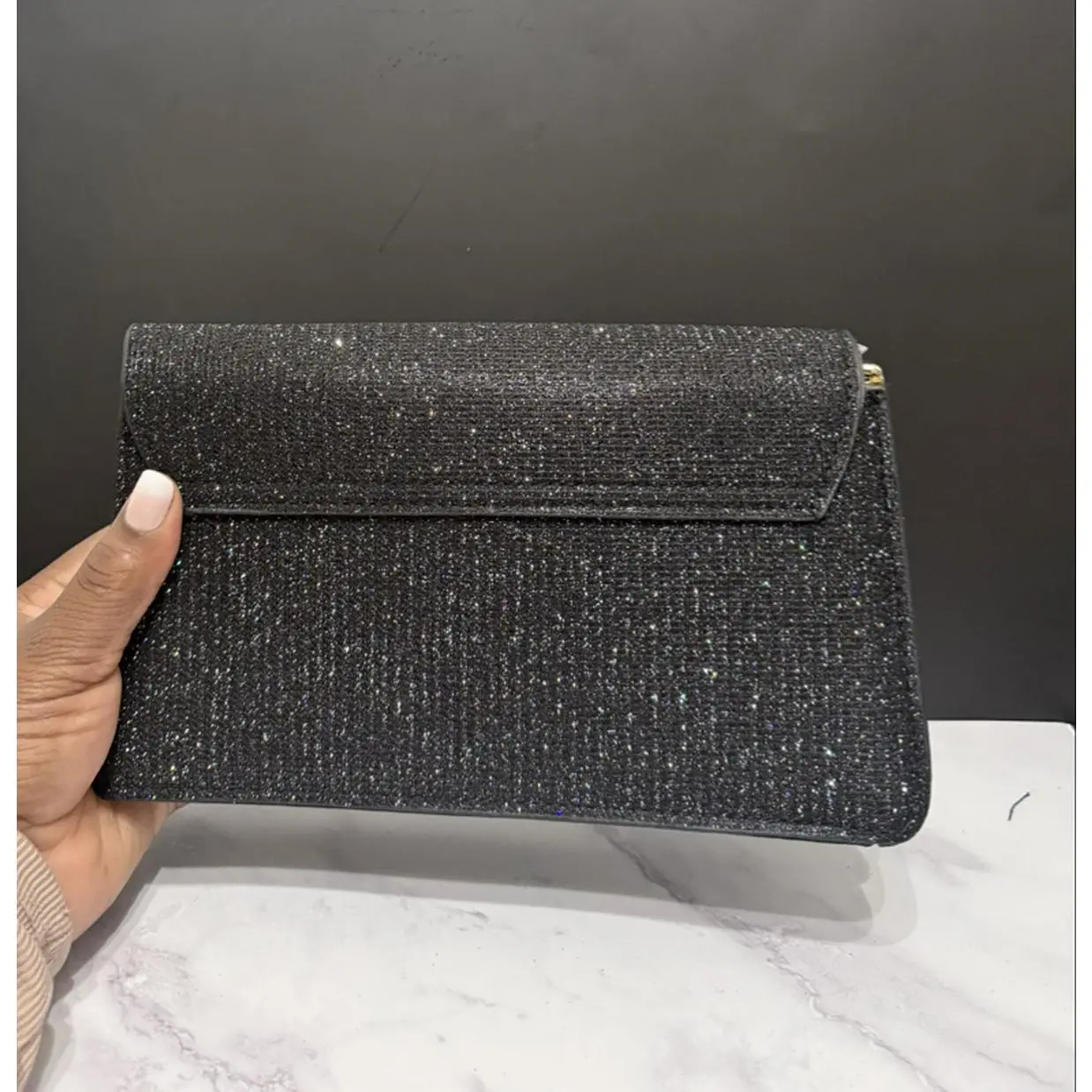 Elegant Black Glitter Clutch Bag with Gold Hardware for Evening Events