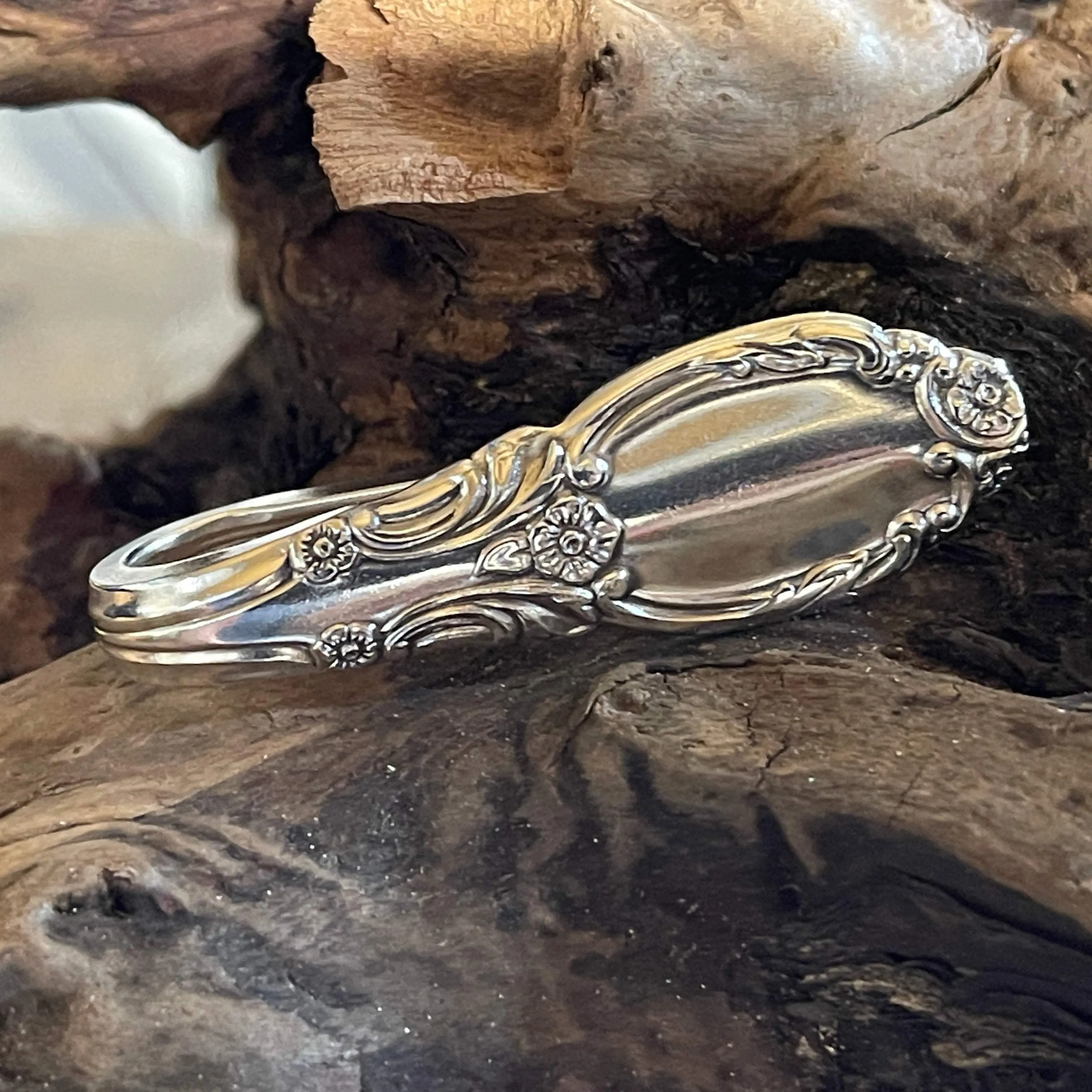 Silverplate floral money clip