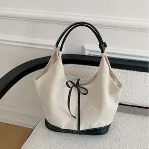 Niche Patchwork Canvas Tote Bag for Women 2025 New Commuter Fashion Handbag Versatile Shoulder Underarm Bag