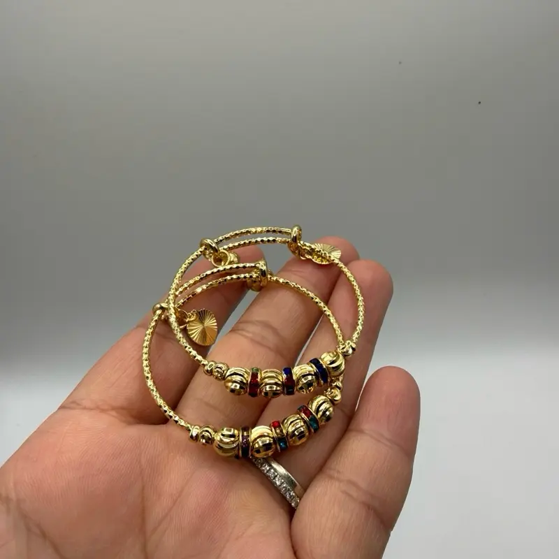Adjustable gold plated bangles