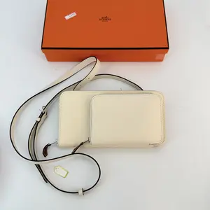 Pre-owned Hermes calf Mini Bags c/ Hermès Nouveau To Go Long Wallet White