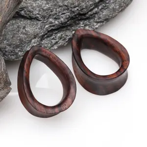 A Pair of Teardrop Rosewood Double Flared Tunnel Plug