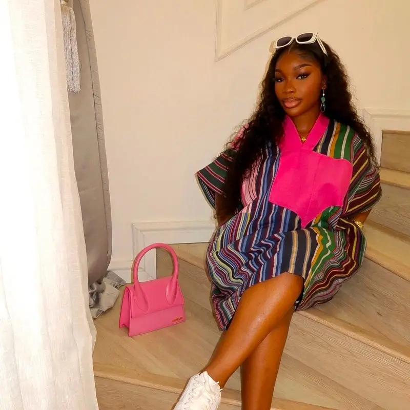 Pink Aso Oke Dress with Striped Pattern and Matching Pink Handbag for Stylish Outfits
