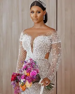 C2022-BB28 - Sheer long sleeve Crystal and Pearl beaded wedding gown