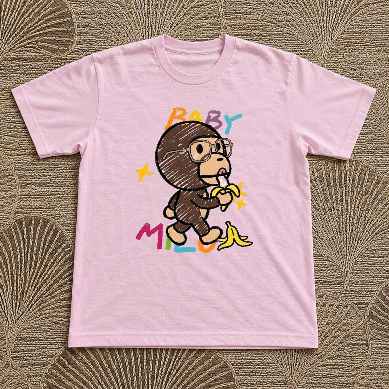Baby Milo Pink Cotton T-Shirt with cartoon monkey holding a banana graphic Baby Milo Pink Cotton T-Shirt with cartoon monkey holding a banana graphic