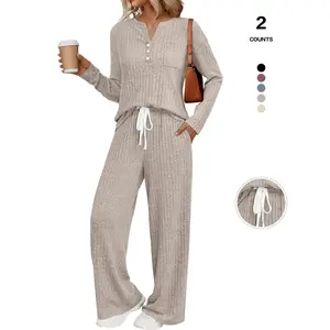 Women’s two-piece ribbed knit loungewear set: long-sleeve button-down V-neck top and drawstring wide-leg pants with pockets. Casual and comfortable two-piece pajama set; can also be worn as outerwear. Women's clothing.
