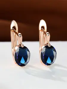 A pair of champagne gold round stone earrings made of synthetic sapphire blue zirconia are fashionable, elegant and retro, suitable for women to wear during travel, wedding parties