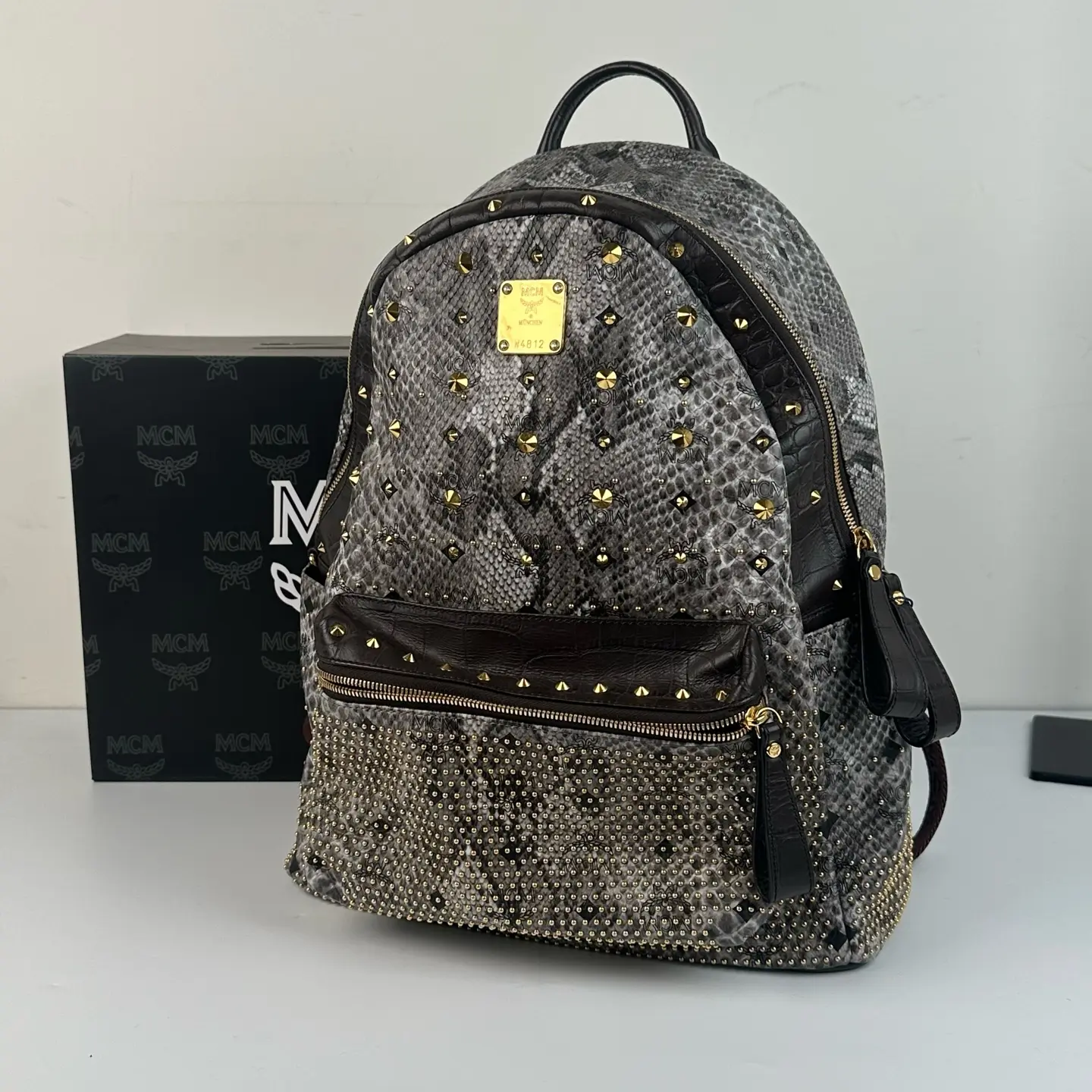 Pre-owned MCM Stark Limited Edition Python Print Rhinestone Studded Backpack