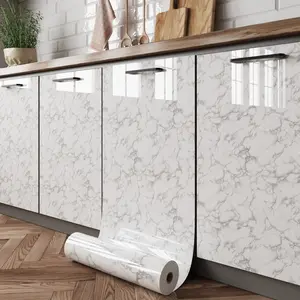 Self-adhesive high-gloss cabinet film with a marble pattern, waterproof and oil-resistant. Ideal for kitchen cabinets, doors, Interior walls. Peel-and-stick, removable Decorative wall sticker for home décor in kitchens, living rooms, and bedrooms.