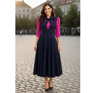 Vestido overol disco  completo   Diseño de corbatas  En 2 tonos rosa magenta en blusa y vestido azul navi al tobillo