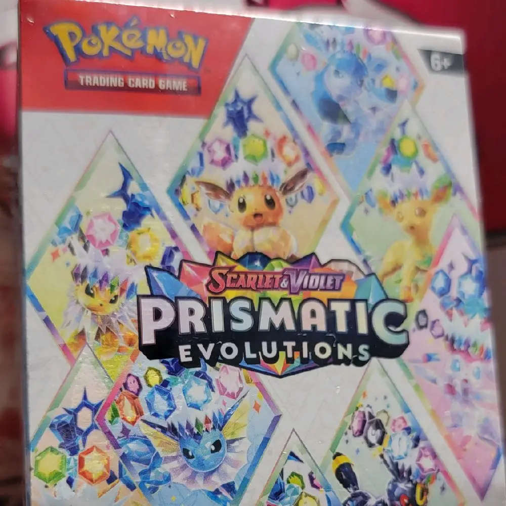 pokemon tcg prismatic evolutions booster pack Best Pokémon TCG deal: Prismatic Evolutions booster packs drop 32% main image 1