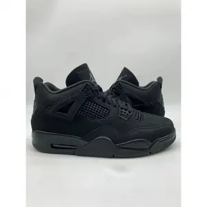 Classic Black Mid-Top Basketball Sneakers Authentic Performance Build, Unisex Style.