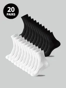 20 pairs of unisex socks, solid black and white casual mid-calf socks, travel socks, moisture-wicking and odor-resistant, minimalist and versatile, comfortable and soft, outdoor sports socks suitable for all seasons