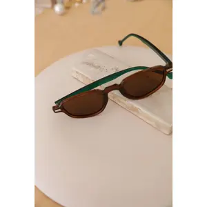 Rae: Rivet Oval Sunglasses with Green Lining