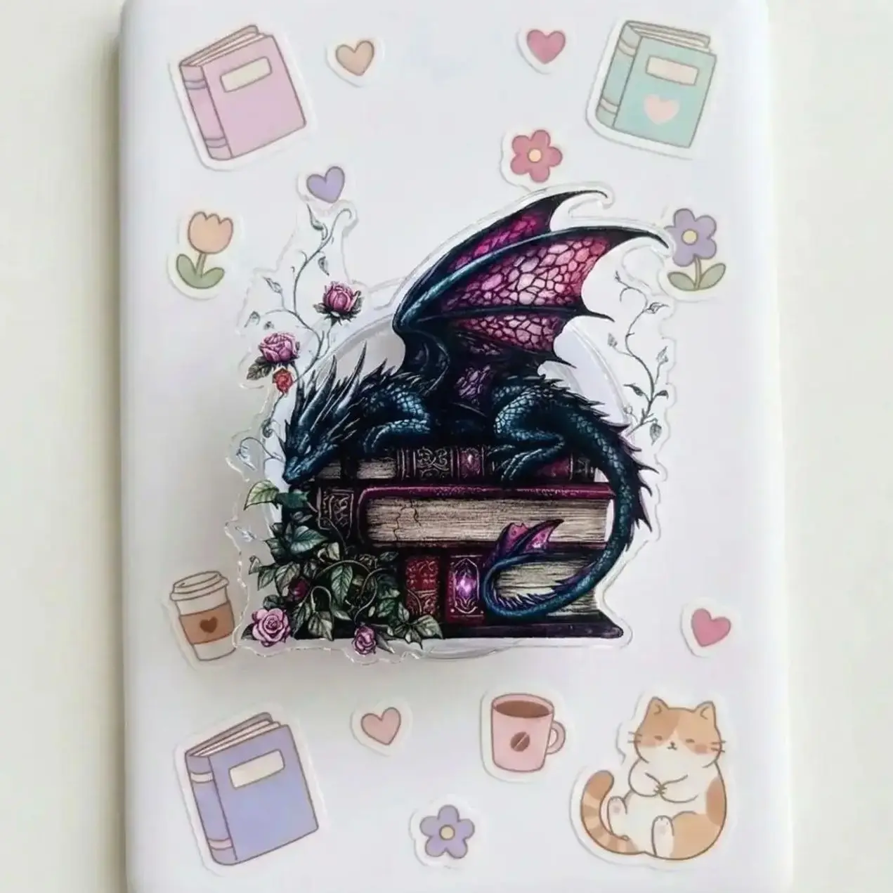 Dragon Sleeping on Books Phone Grip – Fantasy Bookish Accessory, Dark Floral Aesthetic Holder, Unique Gift for Book Lovers & Dragon Fans.
