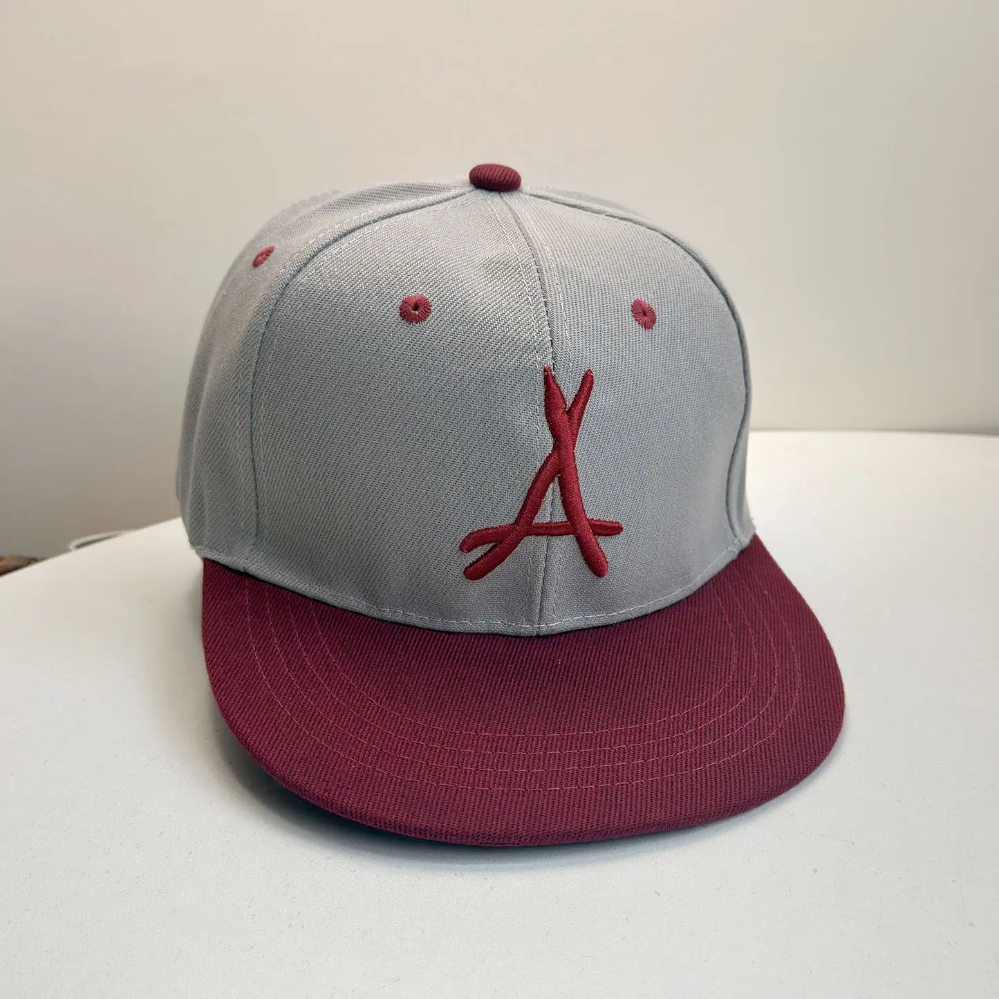 Triangle - burgundy eaves